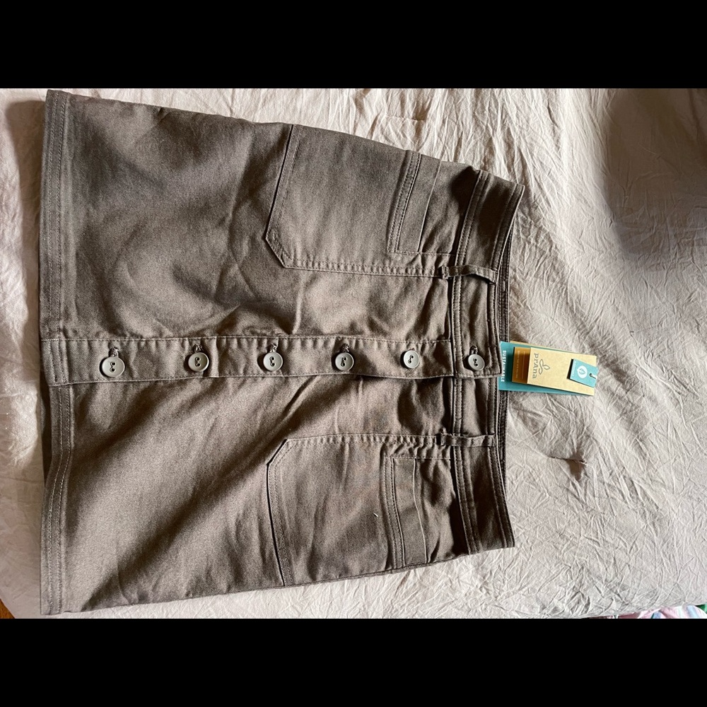 Super cute buttons up front brow color never worn, knee length